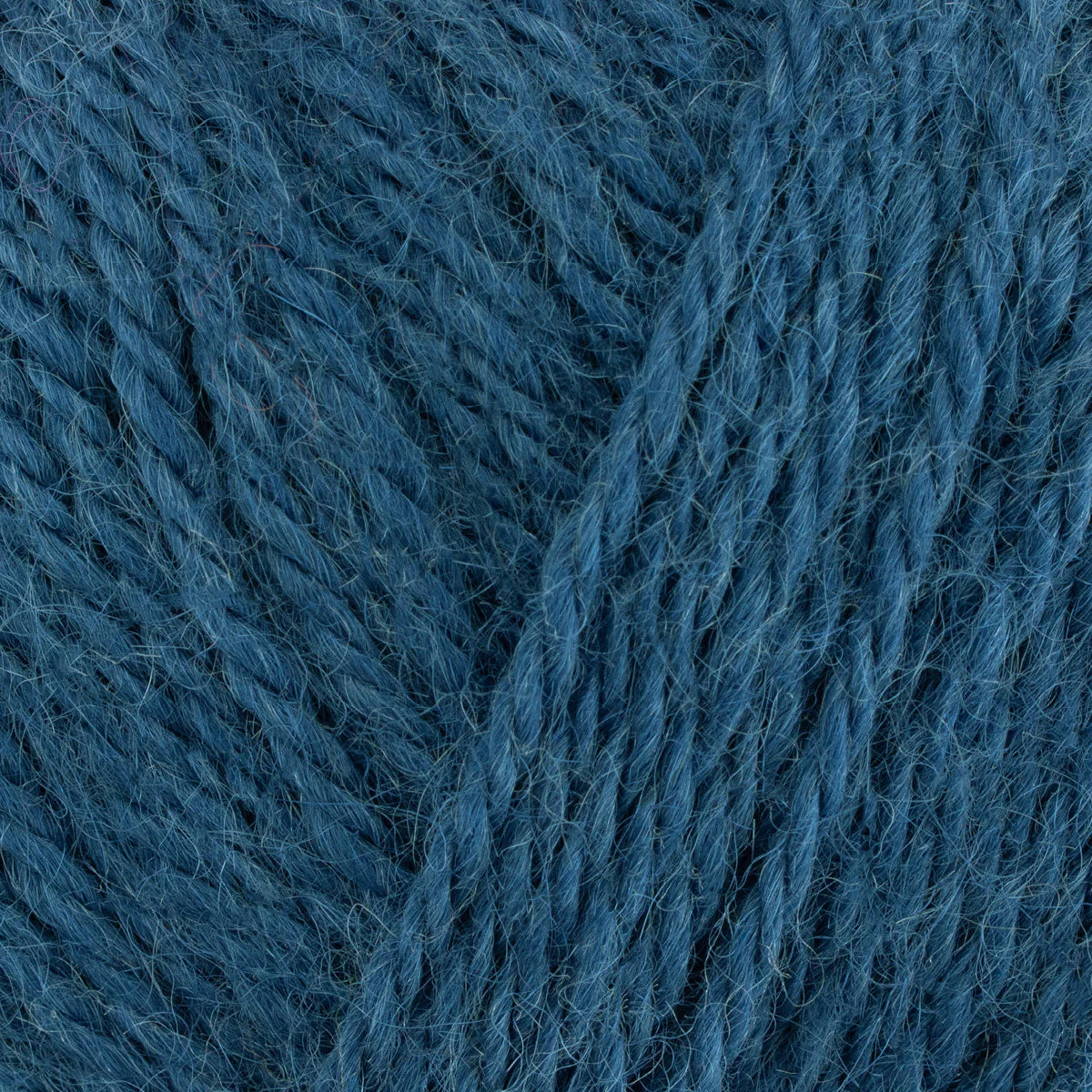 Close-up of blue yarn with a textured pattern