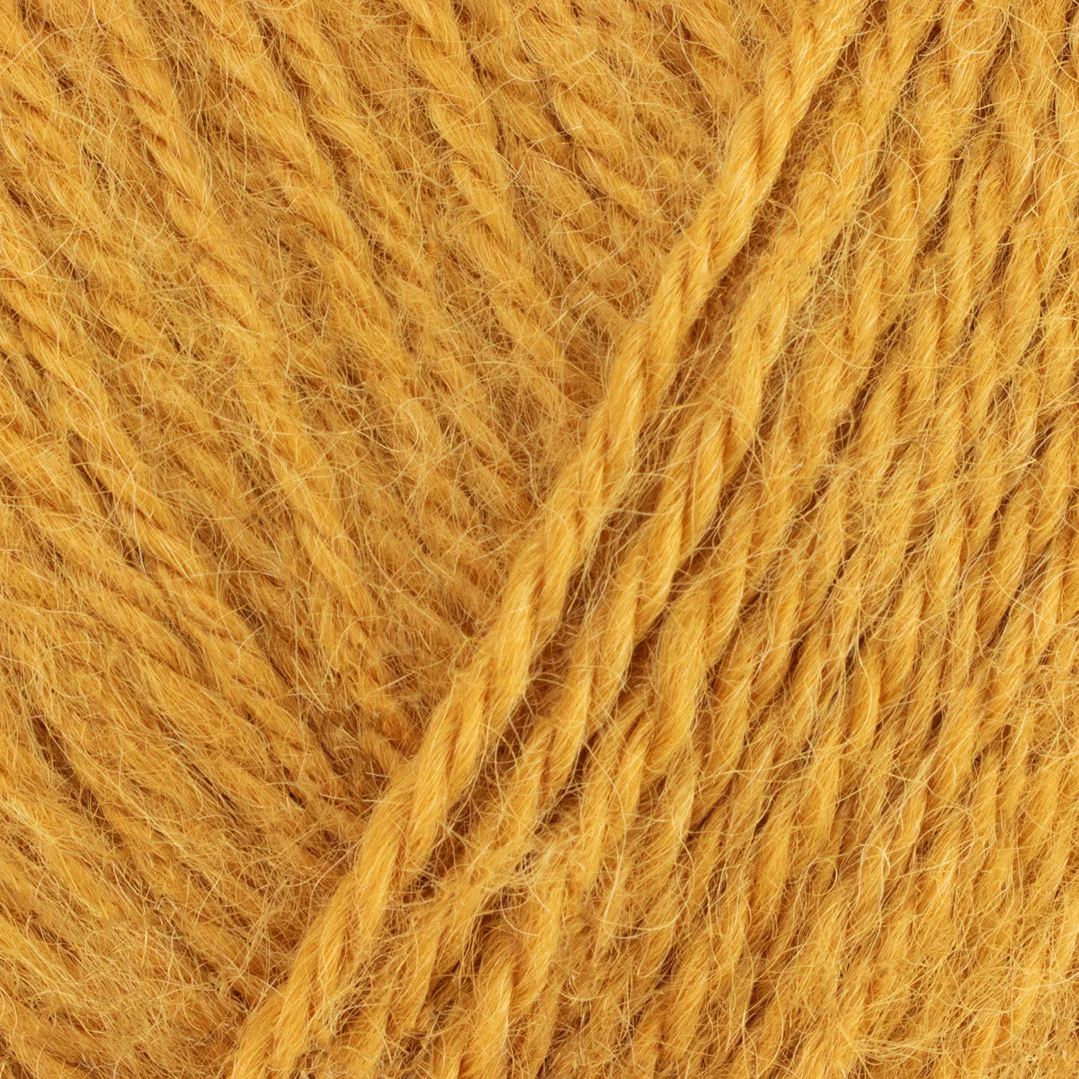Close-up of a ball of yellow yarn