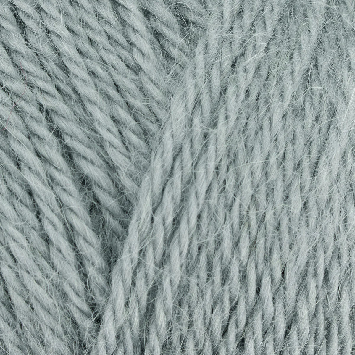 Close-up of gray yarn with a textured pattern