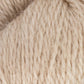 Close-up of beige yarn with a textured surface